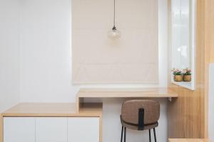 Minimalist and Cozy Studio Apartment at Tuscany Residences By Travelio