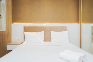 Minimalist and Cozy Studio Apartment at Tuscany Residences By Travelio