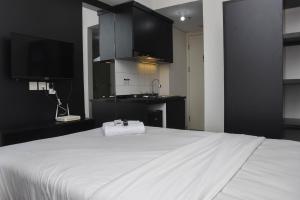 Minimalist Studio at Springlake Summarecon Bekasi Apartment By Travelio