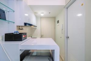 Nice and Comfy Studio at Springlake Summarecon Apartment By Travelio