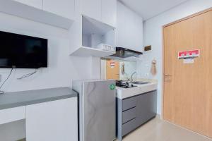 Cozy Style and Comfort Studio Room Apartment at B Residence By Travelio