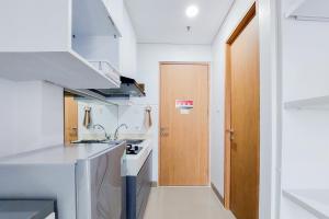 Cozy Style and Comfort Studio Room Apartment at B Residence By Travelio