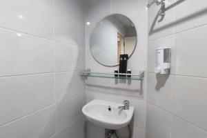 Comfortable and Modern 1BR without Living Room at Amartha View Apartment By Travelio