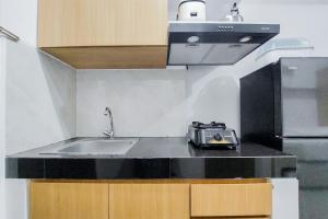 Lovely and Cozy Studio at Serpong Garden Apartment By Travelio