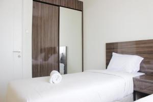 Modern & Relaxing 1BR Apartment at Parahyangan Residence near Parahyangan Catholic University By Travelio