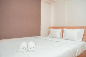 Best Deal and Comfort 2BR Bassura City Apartment By Travelio