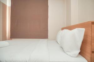 Best Deal and Comfort 2BR Bassura City Apartment By Travelio