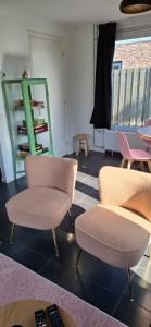 De Strandloper Vakantiehuisje aan het strand - Ferienwohnung am Meer