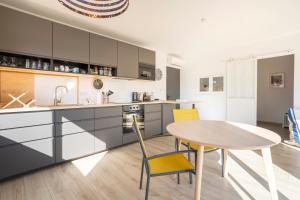 Maisons de vacances La Cabane - 10 min du port : photos des chambres