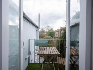 Airy 1850s Coach House with Private Balcony - Pass the Keys