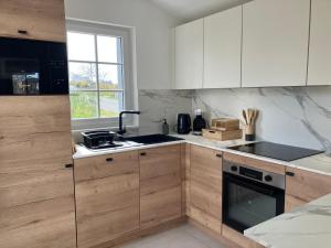 Maison neuve à Le Palais avec WIFI, proche plage - FR-1-418-266