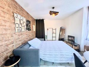 Appartements Spacieux T2 avec balcon : photos des chambres