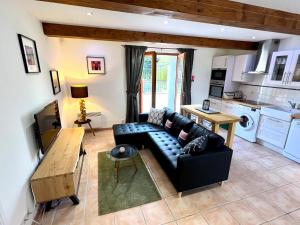 Appartements Les Petites Ecuries - Gite Ponpon : photos des chambres