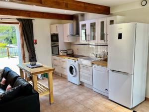 Appartements Les Petites Ecuries - Gite Ponpon : photos des chambres