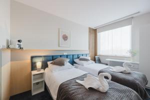 Silver Rooms by Kramm - Pokoje w hotelowym wydaniu