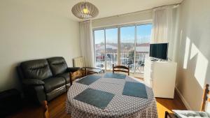 Appartements Le Centre Bourg, situation revee : photos des chambres