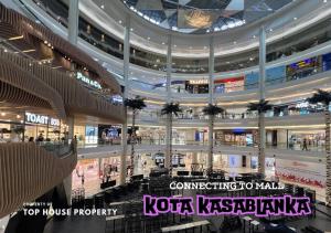 2 Bed Casa Grande Mall Kota Kasablanka, view Swimming Pool By Travelibu