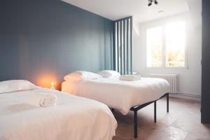 Maisons de vacances L-Unique- Maison de famille en Plein Centre-Ville : photos des chambres