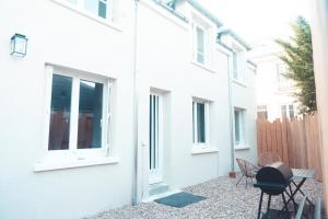 Maisons de vacances L-Unique- Maison de famille en Plein Centre-Ville : photos des chambres