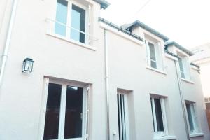Maisons de vacances L-Unique- Maison de famille en Plein Centre-Ville : photos des chambres