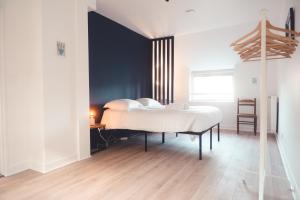 Maisons de vacances L-Unique- Maison de famille en Plein Centre-Ville : photos des chambres