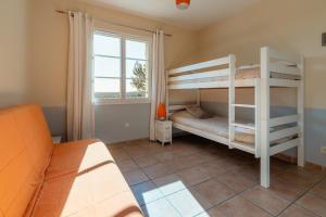Maisons de vacances Villa avec Piscine sur le Golf : photos des chambres