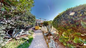 Villa Désir Village Naturiste Jardin et Jacuzzi