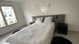 Appartements LinaLand - Charming apartment near Paris : photos des chambres