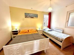Appartements Le Gite Fleuri - Plain-pied - Spacieux - Calme : photos des chambres