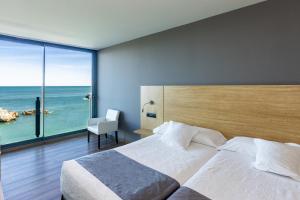 Double or Twin Room with Sea View room in Hotel Astuy