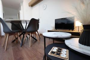 Appartements La perle de champagne 4 pers au coeur des vignes : photos des chambres