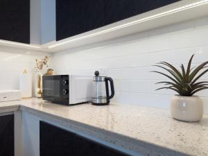 Elite Business & Family Turnkey 433 Residence 2BR in OIA Motor City