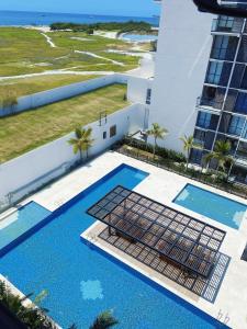 Lujoso con terraza, vista al mar y reserva natural