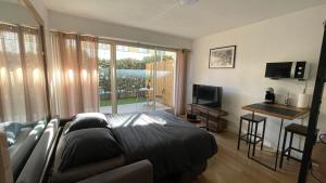 Studio proche plage avec jardinet et parking - Casa Garcia