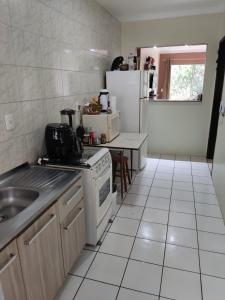 Apartamento de frente com sacada
