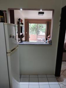 Apartamento de frente com sacada