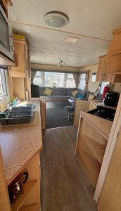 Promenade park 8 Berth caravan next to the beach entrance, WIFI included