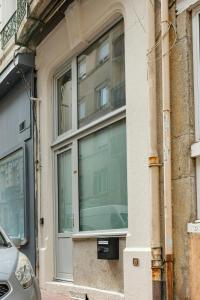 Appartements Charmant hypercentre tram design : photos des chambres