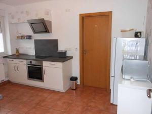 Holiday home in Hage with swimming pool