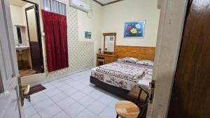 Penginapan Bunga Sonsang Padang Syariah