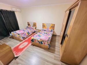 2BR Down Town New Alamein, Behind The Towers