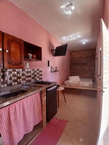 Mini casa pé na areia