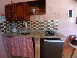 Mini casa pé na areia