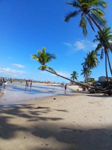 Mini casa pé na areia