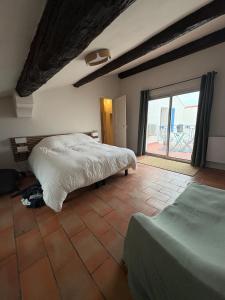 Maisons de vacances La Vigneronne : photos des chambres