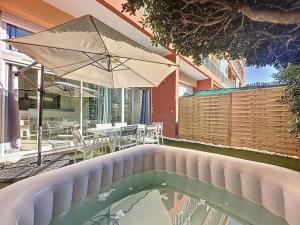 Appartements Elegance et Detente - Parking - Jardin & SPA : photos des chambres
