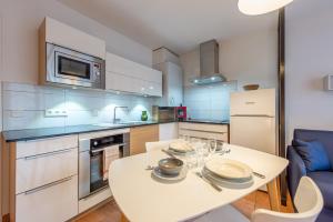 Appartements L-Alaix vivez le coeur de ville : photos des chambres