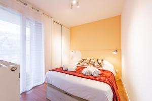 Appartements L-Alaix vivez le coeur de ville : photos des chambres