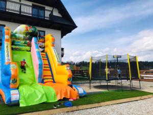 Aparthotel Rabiań-SKI ZEWNETRZNY BASEN ORAZ JACUZZI Z PODGRZEWANĄ WODĄ SALA ZABAW I DMUCHANIEC