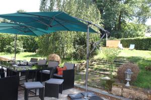 Maisons de vacances La Longere de Quily en Broceliande 12 couchages bain nordique : photos des chambres